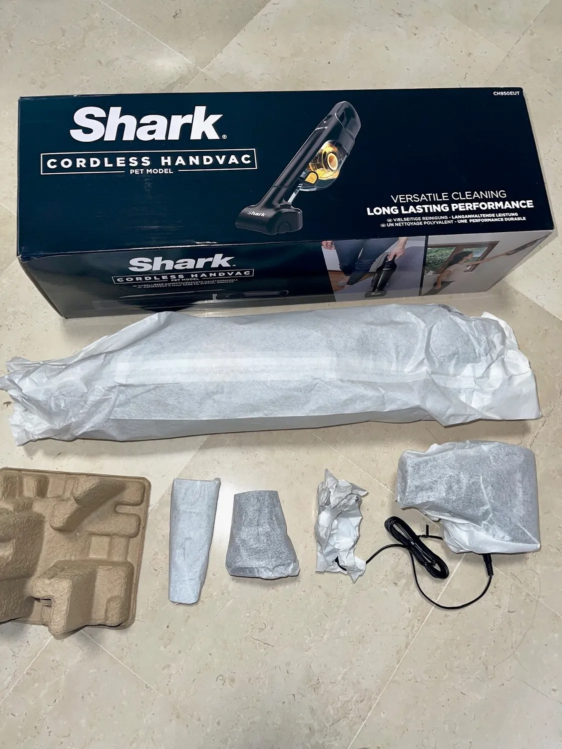 Shark Aspirabriciole senza filo portatile con pet tool nero